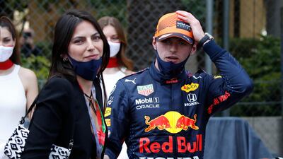 Red Bull's Max Verstappen celebrates winning the Monaco GP with partner Kelly Piquet. Reuters
