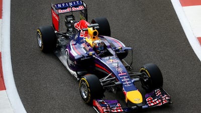 Carlos Sainz Jr. of Spain and Infiniti Red Bull Racing drives during day one of Formula One testing at Yas Marina Circuit on November 25, 2014 in Abu Dhabi, United Arab Emirates. (Photo by Dan Istitene/Getty Images)