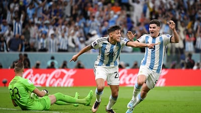 Nahuel Molina celebrates after scoring for Argentina in the first half. Getty