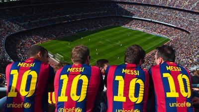 Barcelona fans watch a La Liga match between Barcelona and and Rayo Vallecano in March. David Ramos / Getty Images / March 8, 2015