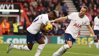 Ryan Sessegnon is congratulated by Harry Kane after pulling a goal back for Tottenham. Getty