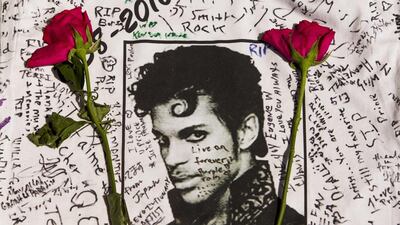 Tributes to Prince outside Apollo Theatre in New York,. Andres Kudacki / AP