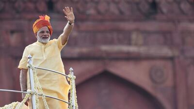 Indian Prime Minister Narendra Modi waves from the Red Fort in New Delhi after his Independece Day speech on August 15, 2017. Prakash Singh / AFP