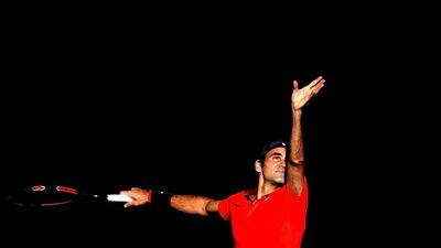 Roger Federer serves to Grigor Dimitrov during his semi-final win at the Brisbane International tournament on Saturday. Bradley Kanaris / Getty Images / January 10, 2015