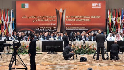 Energy ministers from Opec and other oil-producing countries attend the opening session of the International Energy Forum in Algiers, Algeria. Sidali Djarboub / AP Photo