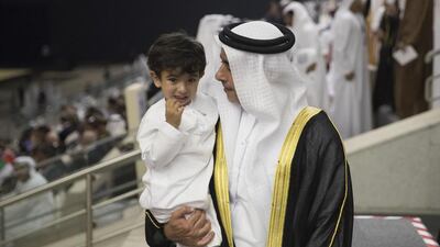 Lt Gen Sheikh Saif bin Zayed, Deputy Prime Minister and Minister of Interior and his son Sheikh Ahmed bin Saif attend National Day celebrations at Adnec. Mohamed Al Hammadi / Crown Prince Court — Abu Dhabi