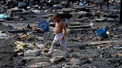 A Rohingya child in a refugee camp in New Delhi, India. Myanmar's anti-junta movement is championing the persecuted minority. AFP