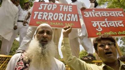 Indian Muslims raise anti-terrorism slogans during a protest against recent explosions across India, in New Delhi, India.