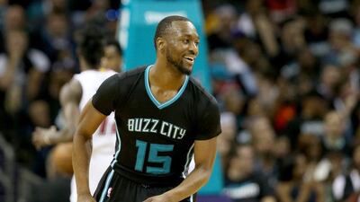 Kemba Walker of the Charlotte Hornets reacts after a play against the Miami Heat during game three of the Eastern Conference Quarterfinals of the 2016 NBA Playoffs at Time Warner Cable Arena on April 23, 2016 in Charlotte, North Carolina. Streeter Lecka/Getty Images/AFP