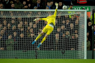 Everton's goalkeeper Jordan Pickford can't save Liverpool's Curtis Jones from scoring. EPA