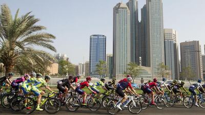 The peloton moves through Abu Dhabi city on Friday during the second stage of the inaugural Abu Dhabi Tour. Claudio Peri / EPA