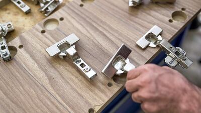 The team produces coffee cabinets, shelves and canes