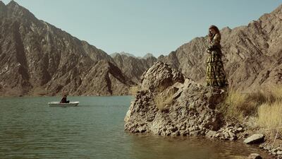 Ships in the night: On Jaffer, left, shirt, Dh1,582, Pal Zileri. Blazer, Dh13,200, Louis Vuitton. Trousers, Dh2,625, Salvatore Ferragamo. On Iullia, right, dress, Dh47,586, Dolce & Gabbana at The Outset, Jacket, Dh860, Deus Ex Machina at Capital D Studio