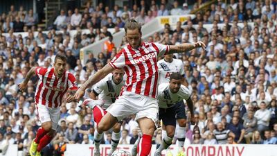 Marko Arnautovic pulls the first goal back for Stoke from the penalty spot. The game finished 2-2. Ian Kington / AFP