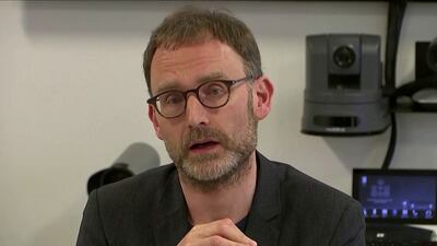 Epidemiologist Neil Ferguson said it was too early to say whether England would need to bring back restrictions. Reuters