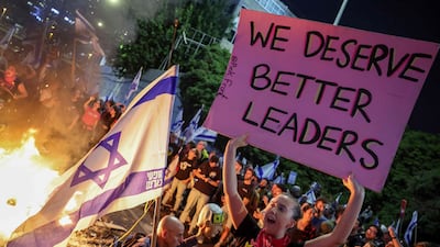 Protestors barricade a road in Tel Aviv. AFP