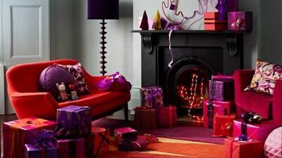 Pair colour-blocked furniture with something striking like the Kaleidoscope 2 rug by Sonya Winner (www.sonyawinner.com). Photo by Adrian Briscoe