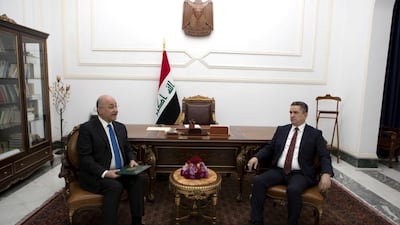 Iraq's President Barham Salih meets with new prime minister designate Adnan Al Zurfi in Baghdad, Iraq on March 17, 2020. The Presidency of the Republic of Iraq Office Handout via Reuters