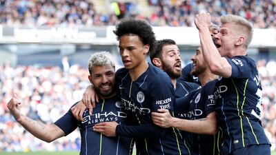 Manchester City's Sergio Aguero celebrates scoring their goal with Leroy Sane and teammates. Reuters
