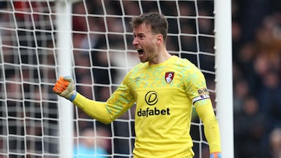 Goalkeeper Neto celebrates after Salah's miss from the spot. AFP