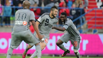 Marseille forward Andre-Pierre Gignac, centre, celebrates after scoring the winning goal against Caen on Saturday in his side's Ligue 1 victory. David Vincent / AP / October 4, 2014