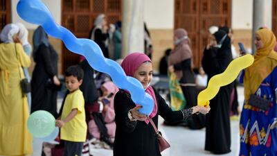 Children play after Eid Al Adha prayers in Al Azhar Mosque in Cairo, Egypt, on July 20, 2021.