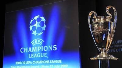 The Uefa Champions League trophy, the prize all 32 teams will be vying for. Fabrice Coffrini / AFP