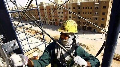 A labourer works on Dar Al Arkan's Al Qasr project in Riyadh. Reuters