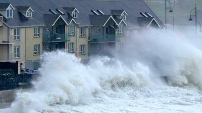 Waves at high tide in Tramore, County Waterford, Ireland, Wednesday, Sept. 27, 2023. Weather warnings will come into force as the UK and Ireland brace for the arrival of Storm Agnes, which will bring damaging winds and big stormy seas. Agnes, the first named storm of the season, will affect western regions of the UK and Ireland, with the most powerful winds expected on the Irish Sea coasts. (Niall Carson / PA via AP)