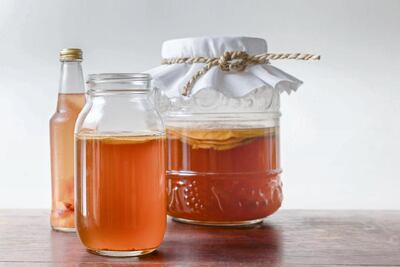 Kombucha tea is a popular fermented drink with natural probiotics. Getty