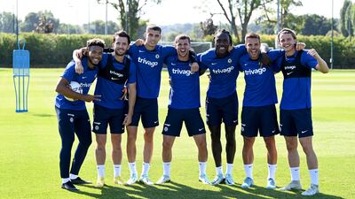Chelsea's Ben Chilwell, Kai Havertz, Mason Mount, Trevoh Chalobah, Cesar Azpilicueta, Reece James and Conor Gallagher celebrate winning a mini tournament during a training session in Cobham, England. All photos Getty Images