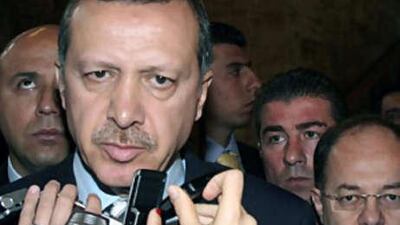 Turkey's Prime Minister Tayyip Erdogan speaks to the media yesterday, after Turkish police detained 21 people during raids against an alleged network of nationalists accused of plotting to topple the government,