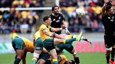 Australia's Nic White (C) kicks the ball during the Bledisloe Cup rugby union match between New Zealand and Australia in Wellington. AFP