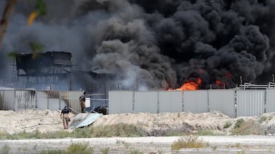 Fire broke out at the under-construction site near festival plaza in Jebel Ali in Dubai. Dubai Civil Defence personals trying to control the fire. Pawan Singh / The National
