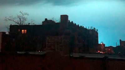 The night sky is illuminated in a bright, blue colour after an explosion in the Queens borough of New York. AP Photo