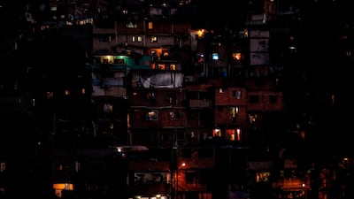 Partial view of the Caracas neighborhood Petare hill - where electric power has been restored - on March 10, 2019, during the third day of a massive power outage which has left the capital and much of the country without communications, water and electricity. AFP