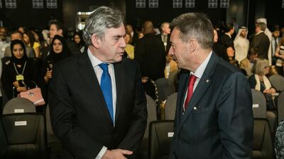 Former British prime minister Gordon Brown, left, and Peter Maurer, president of the International Committee of the Red Cross, during the opening plenary of the World Economic Forum's Summit on the Global Agenda being held in Abu Dhabi. Courtesy World Economic Forum