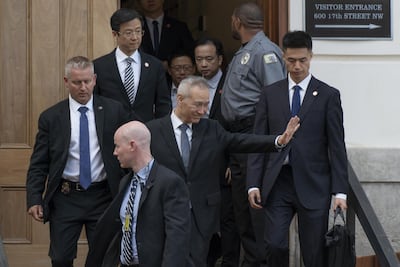China's Vice Premier Liu He waves as he departs the office of the US Trade Representative in Washington on Thursday. Bloomberg