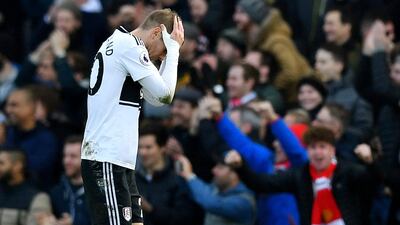 Fulham's Maxime Le Marchand looks dejected after conceding their second goal. Reuters