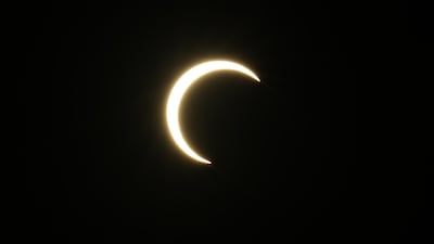 UAE residents are being urged to enjoy the partial solar eclipse safely. EPA