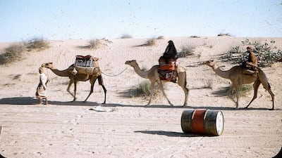 Members of a Bedouin tribe passing through the desert of the Western Region some time around 1960. Courtesy John Vale