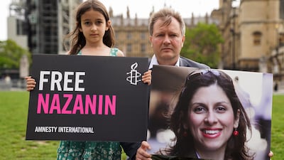 On Thursday, Nazanin Zaghari-Ratcliffe's husband Richard and daughter Gabriella marked Nazanin's 2,000th day in detention. PA