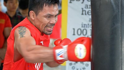 Apart from boxing, Manny Pacquiao also serves as a senator in the Philippine legislature. Ted Aljibe / AFP