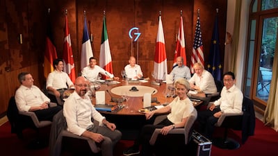 G7 leaders have dinner at Elmau Castle in Kruen, Germany. Clockwise from front left, European Council President Charles Michel, Italy's Prime Minister Mario Draghi, Canada's Prime Minister Justin Trudeau, French President Emmanuel Macron, German Chancellor Olaf Scholz, US President Joe Biden, British Prime Minister Boris Johnson, Japan's Prime Minister Fumio Kishida and European Commission President Ursula von der Leyen. AP