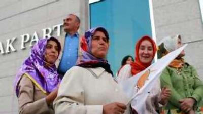 It's our party: AKP supporters celebrate the party's victory in a court case challenging its legitimacy.