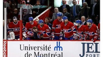 Max Pacioretty lies on the ice after being bodychecked by Zdeno Chara in Montreal. Richard Wolowicz / Getty Images