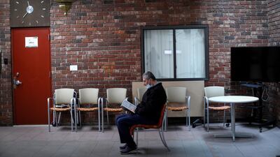 Ahmed Al Fateh sits alone reading the Quran shortly before midday prayers in Patterson, New Jersey, US. Reuters