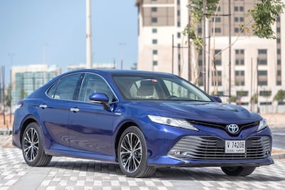 The Toyota Camry Hybrid is one of many of the brand's cars being offered with cashback of up to Dh10,000. Antonie Robertson
