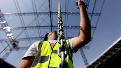 Going up: work takes place at the the venue for the Ultimate Fighting Championship at Ferrari World on Yas Island.