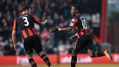 AFC Bournemouth’s Max Gradel, right, celebrates scoring against Swansea City during the Premier League match at the Vitality Stadium, Bournemouth, England, Saturday March 12, 2016. (Andrew Matthews/PA via AP)